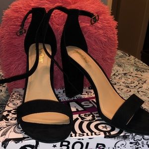 Black high heels with heel grips included!